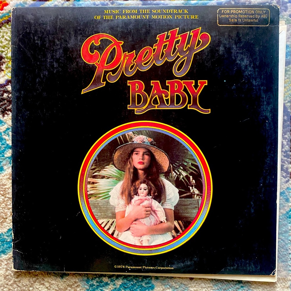 Gold stamped promo copy of the controversial film Pretty Baby VG+ VG+